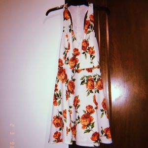 Floral swing low neck dress